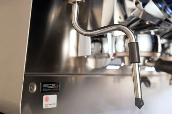 A close up of the handle on an industrial kitchen