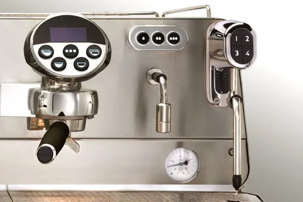 A coffee machine with some buttons and knobs