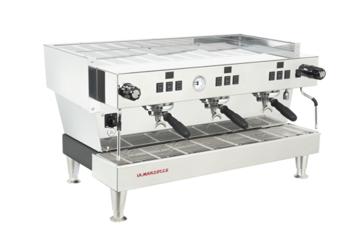 Commercial espresso machine with three group heads.